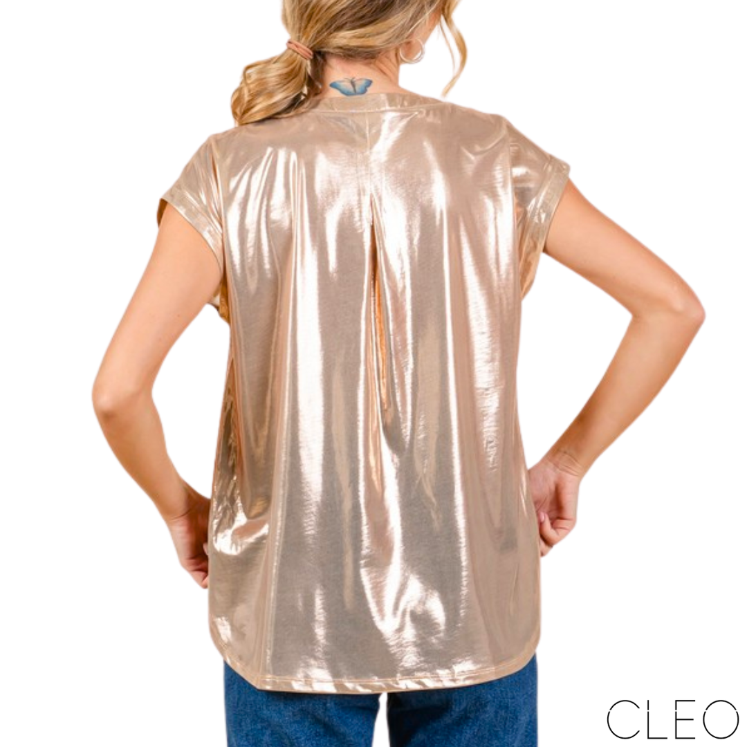Blusa metálica dorada